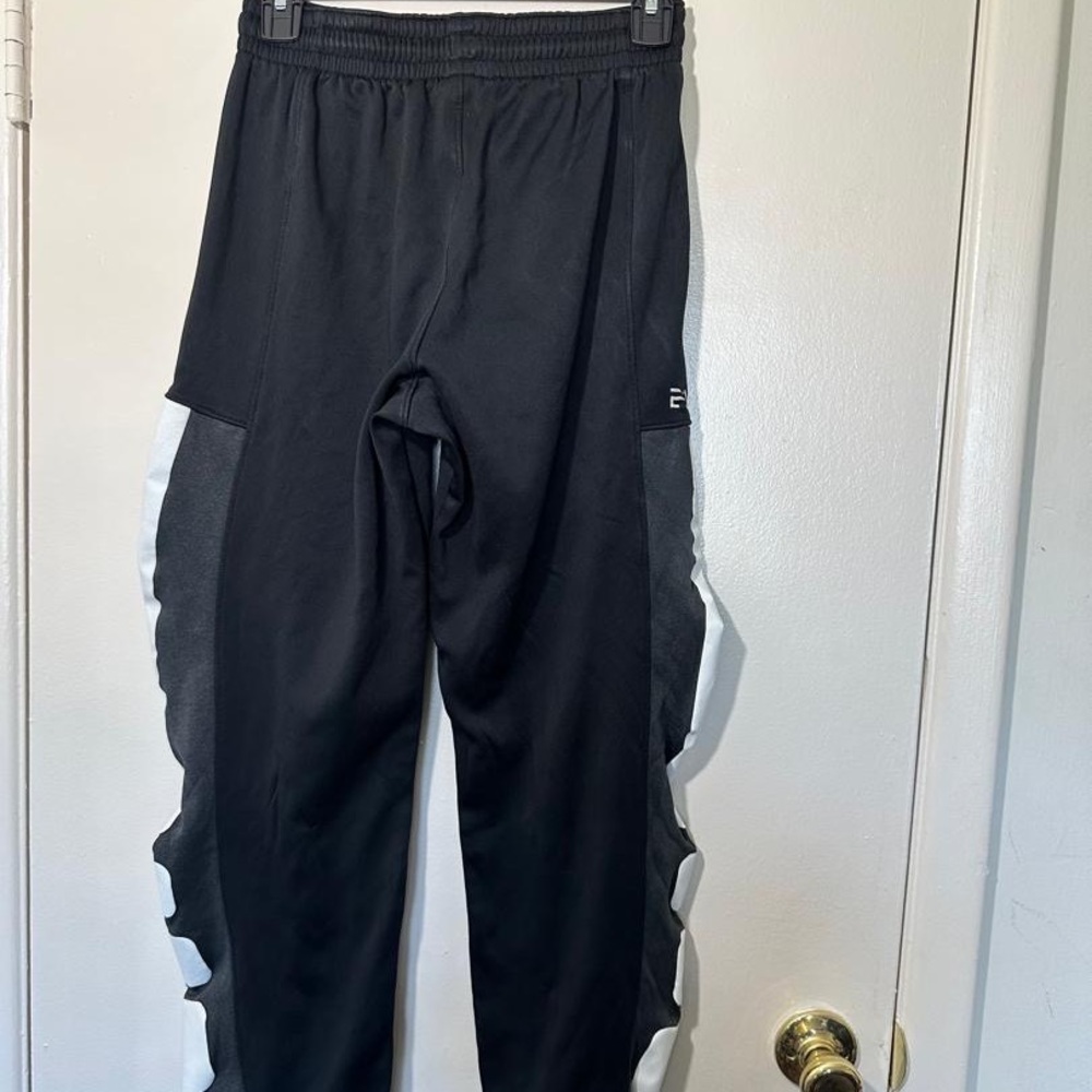 Nike Therma-FIT black athletic pants colorway